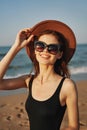 cheerful woman in sunglasses Sandy coast landscape sun