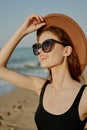 cheerful woman in sunglasses Sandy coast landscape sun