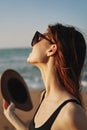 cheerful woman in sunglasses Sandy coast landscape sun