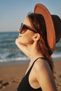 cheerful woman in sunglasses Sandy coast landscape sun