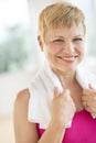 Cheerful Woman With Towel Around Neck Royalty Free Stock Photo