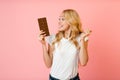 Cheerful woman want to eat milk chocolate Royalty Free Stock Photo