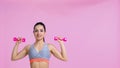 cheerful woman working out with dumbbells Royalty Free Stock Photo