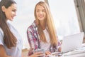 Cheerful women working on project Royalty Free Stock Photo