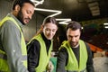 Cheerful workers in high visibility vests