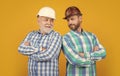 cheerful workman generation men in studio. workman generation men on background Royalty Free Stock Photo