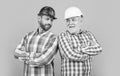 cheerful workman generation men in studio. workman generation men on background Royalty Free Stock Photo