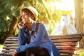 Cheerful young african american woman sitting outside Royalty Free Stock Photo