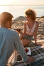 Cheerful young caucasian couple drinking red wine Royalty Free Stock Photo