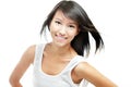 Cheerful young chinese girl with windswept hair