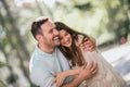 Cheerful young couple having fun and laughing together