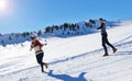 Cheerful young couple having fun in winter park Royalty Free Stock Photo