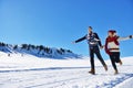 Cheerful young couple having fun in winter park Royalty Free Stock Photo