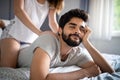 Cheerful young couple making massage at home Royalty Free Stock Photo