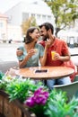 Cheerful young couple on a romantic date in a cafe. Royalty Free Stock Photo