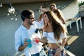 Happy young dancing couple having fun and enjoying party at summer Royalty Free Stock Photo