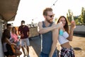 Happy young dancing couple having fun and enjoying party at summer Royalty Free Stock Photo