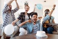 Cheerful young friends having fun on party Royalty Free Stock Photo