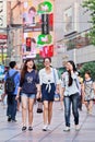Cheerful young girls in a shopping area, Shanghai, China Royalty Free Stock Photo