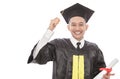 Cheerful young graduated student man holding diploma Royalty Free Stock Photo