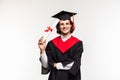 Cheerful young graduated student man isolated on white background Royalty Free Stock Photo