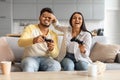 Cheerful Young Indian Couple Having Fun At Home, Playing Video Games Together Royalty Free Stock Photo