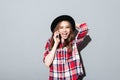 Cheerful young lady talking by phone. Royalty Free Stock Photo