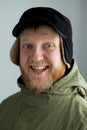 Cheerful young man in a hat Royalty Free Stock Photo