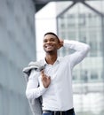 Cheerful young man smiling with white shirt Royalty Free Stock Photo