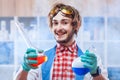 Cheerful man with chemistry flasks