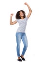 Cheerful young woman with arms raised Royalty Free Stock Photo
