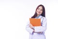 Cheerful woman doctor in uniform with stethoscope holding clipboard isolated on white background. Smile female medical Royalty Free Stock Photo