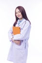 Cheerful young woman doctor in uniform with stethoscope holding clipboard isolated on white background. Smile female medical Royalty Free Stock Photo