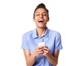 Cheerful young woman laughing with mobile phone Royalty Free Stock Photo