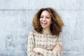 Cheerful young woman laughing outdoors Royalty Free Stock Photo