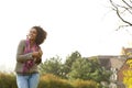 Cheerful young woman laughing outside Royalty Free Stock Photo