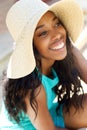 Cheerful young woman laughing with sun hat Royalty Free Stock Photo