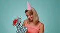 Cheerful woman opening gift box, unwrapping birthday surprise, satisfied with best present bonus Royalty Free Stock Photo