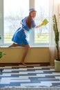 Pretty housemaid smiling. Royalty Free Stock Photo