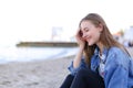 Portrait of cheerful girl who poses on camera and cute laughs si Royalty Free Stock Photo