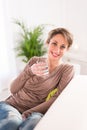 Cheerful young women drinking mineral water