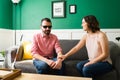 Happy woman talking with a blind man