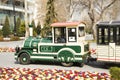 Cheerfully painted children`s train for walks in the amusement park