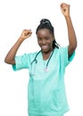 Cheering african american female nurse or medical student Royalty Free Stock Photo