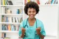 Cheering afro american female nurse at work