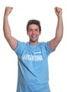 Cheering argentinian sports fan Royalty Free Stock Photo