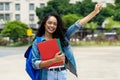 Cheering brazilian female student with braces