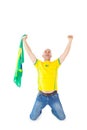 Cheering brazilian football fan in yellow