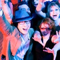 Cheering crowd in disco club Royalty Free Stock Photo