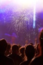 Cheering crowd in front of stage lights - retro photo Royalty Free Stock Photo